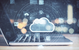 Laptop with cloud computing diagram. Cloud computing and communication concept.