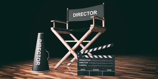 Cinema director chair and clapper on wooden background. 3d illustration