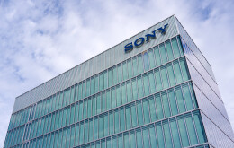 Looking up glass facade of office tower of Sony headquarters of Switzerland at Swiss city of Schlieren on a cloudy late summer afternoon. Photo taken September 16th, 2025, Schlieren, Switzerland.